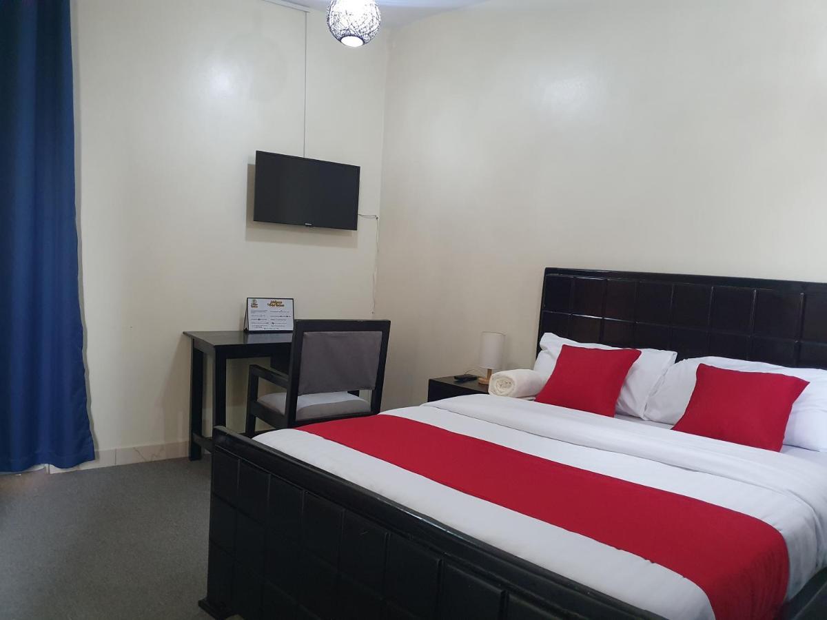 The Palm Residence Kampala Bagian luar foto