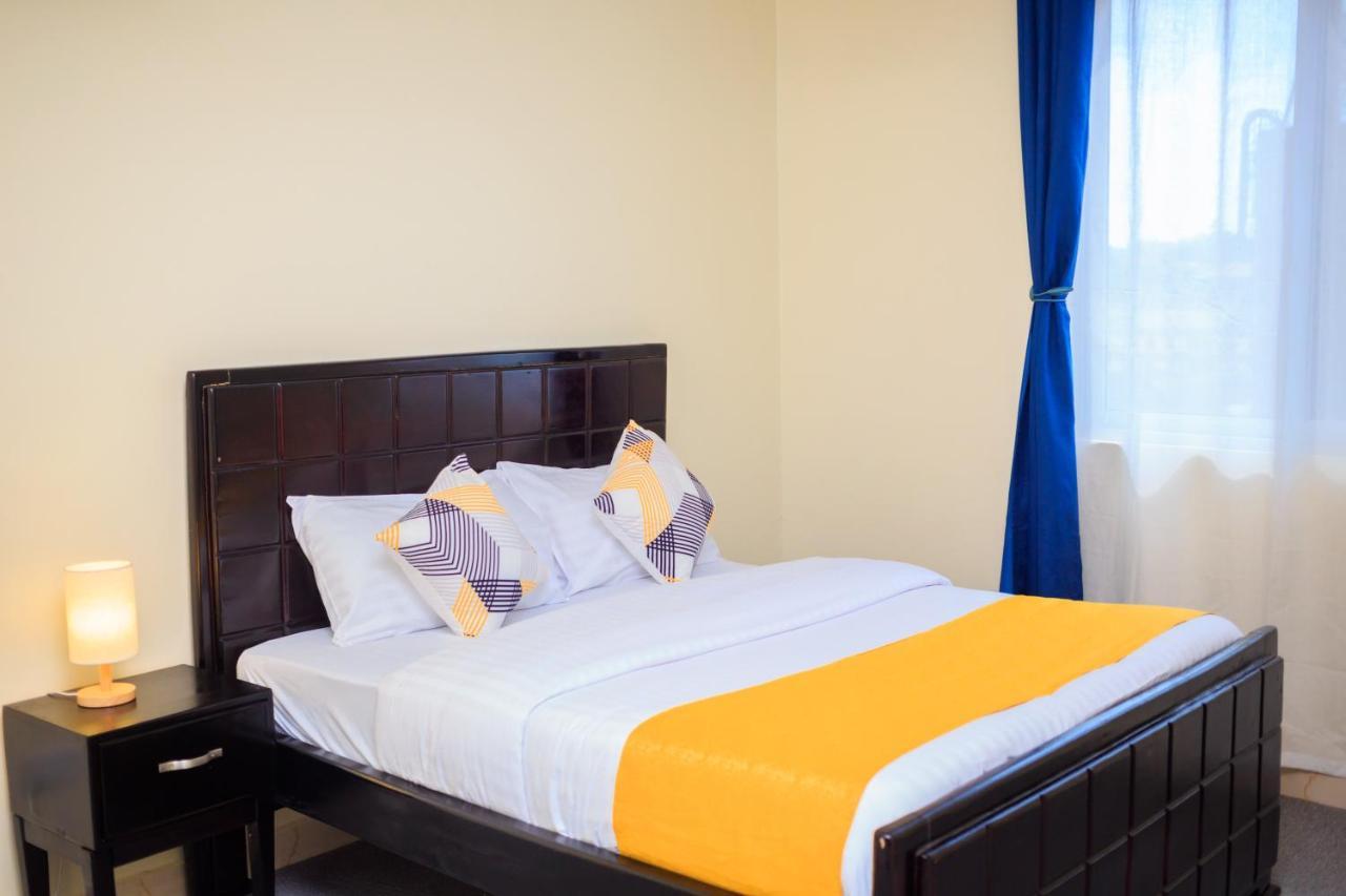 The Palm Residence Kampala Bagian luar foto